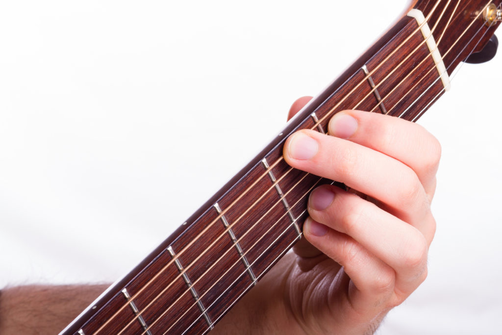 G major chord performed on acoustic guitar - first guitar chord